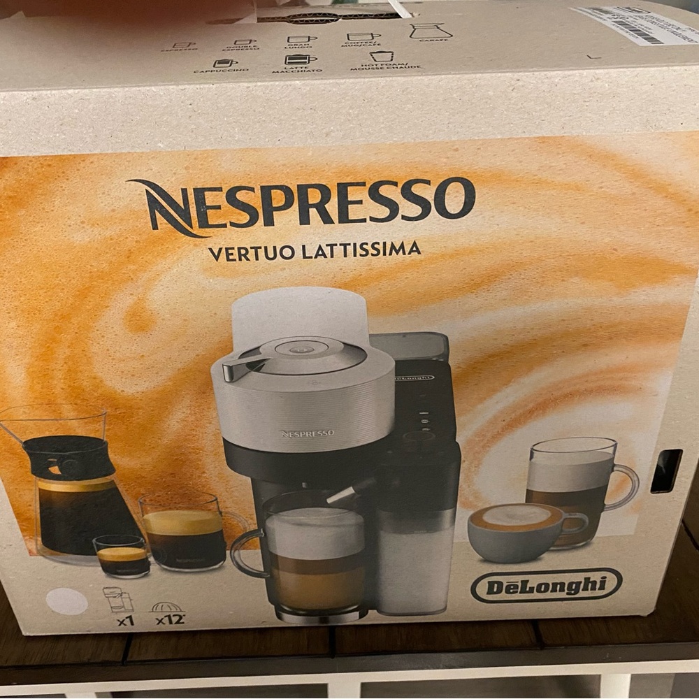 Nespresso DeLonghi Coffee Machine in Black and Silver